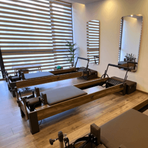 pilates-reformer3-scaled-e1774865077271-300x300 (1) Pilates Reformer studio Athens Marks Ground Exclusive Training Studios premium fitness